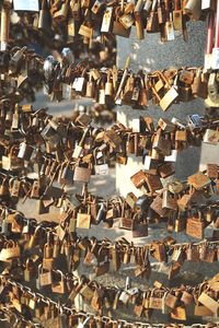 Rusty padlocks attached to railings