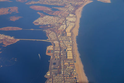 Aerial view of cityscape and sea