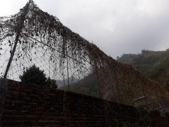 Low angle view of mountain against sky