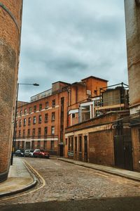 Buildings in city against sky