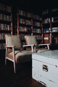 Empty old chairs and tables in library