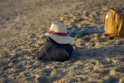 Bag and hat at beach