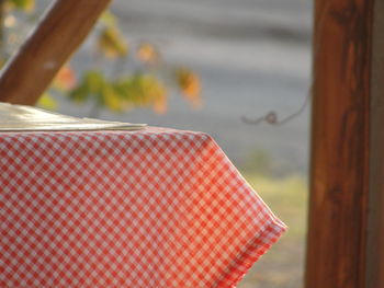 Close-up of red heart shape on table