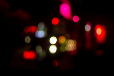 Defocused image of illuminated lights at night