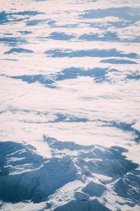 Aerial view of snow covered landscape