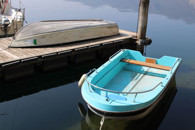 Boats moored at harbor