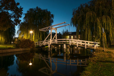 Classic dutch draw bridge in the village of hazerswoude-dorp, near leiden, holland