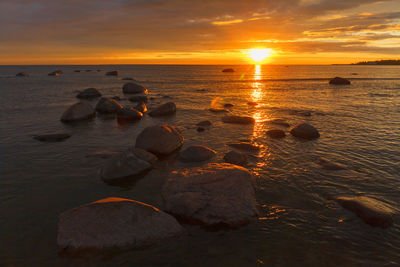 Scenic view of sea against sky during sunset