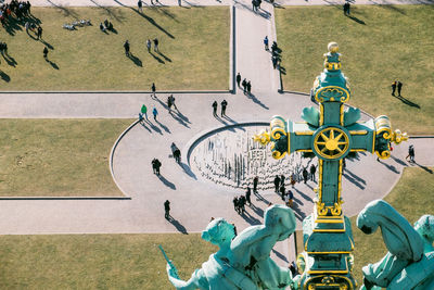 High angle view of people on town square in city