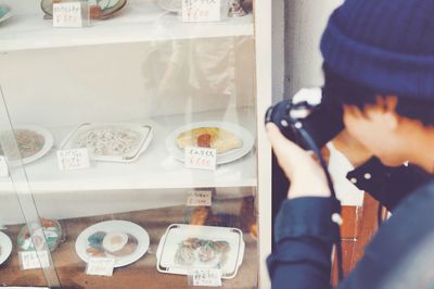 Close-up of man having food