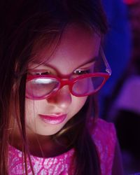 Close-up of smiling girl wearing eyeglasses