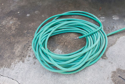 High angle view of blue pipes on table