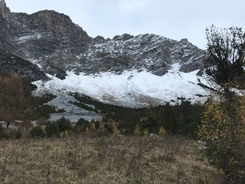 Scenic view of snowcapped mountains against sky