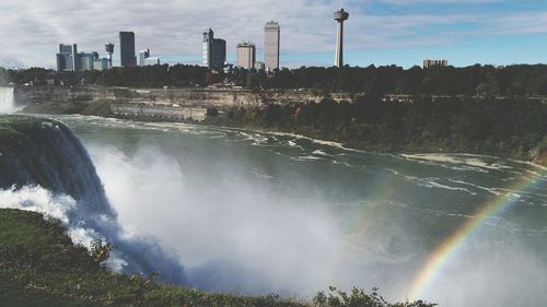 View of city against cloudy sky