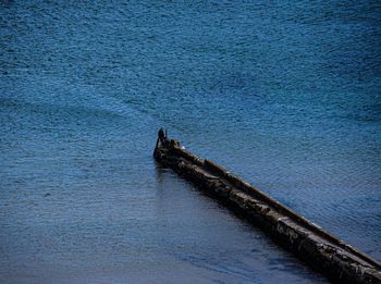 High angle view of sea against blue sky