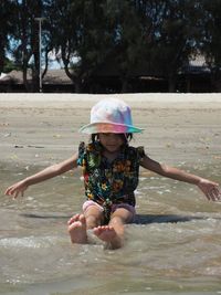 Full length of girl enjoying in water