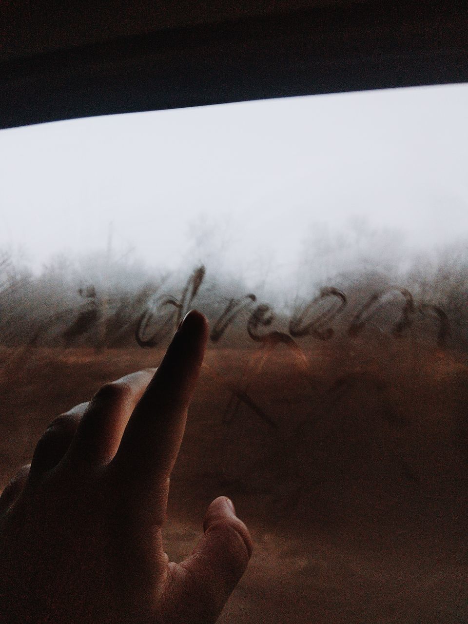 human hand, hand, human body part, real people, one person, body part, human finger, finger, unrecognizable person, smoke - physical structure, personal perspective, nature, lifestyles, sky, outdoors, leisure activity, day, fog