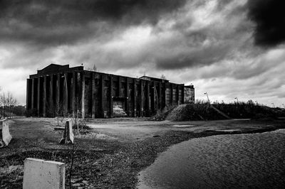 Old building against cloudy sky