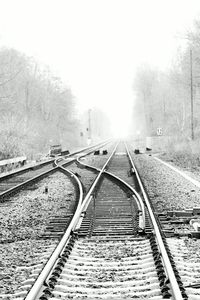 Railroad tracks in foggy weather