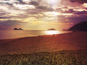 Scenic view of sea at sunset