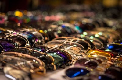 Close-up of colorful sunglasses on table