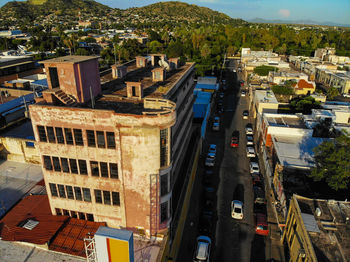 High angle view of street amidst buildings in city