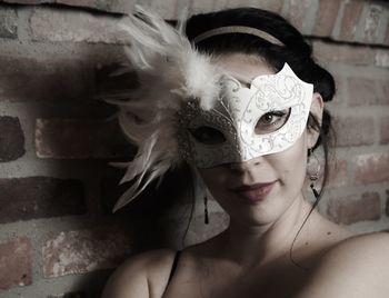 Portrait of young woman wearing mask