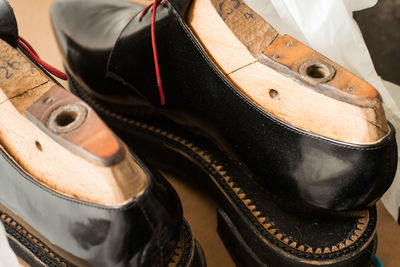 High angle view of leather shoes