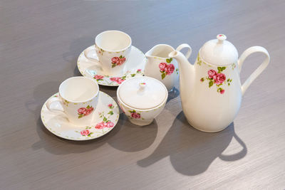 High angle view of tea cups on table