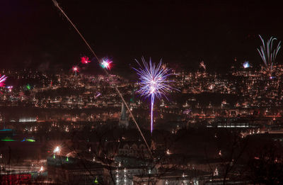 Firework display at night