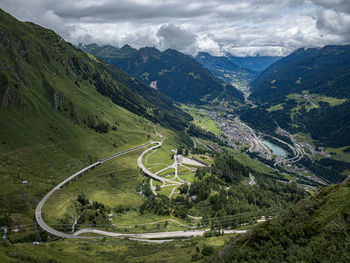 High angle view of trees and mountains against sky