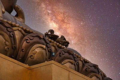 Low angle view of cathedral against sky at night