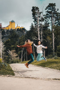 People jumping in park