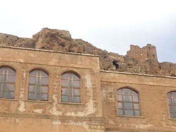 Low angle view of historical building against clear sky