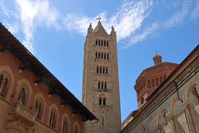 Low angle view of bell tower against sky