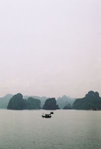 Scenic view of boats in sea