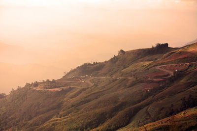 Scenic view of mountains against sky during sunset