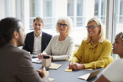 Business colleagues working at office