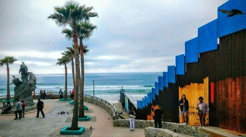 Panoramic view of people on beach