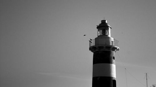 Low angle view of lighthouse against clear sky