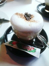 Close-up of coffee cup on table