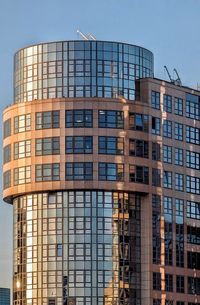 Low angle view of modern building against clear sky