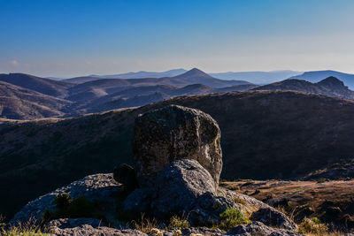 Panoramic view of rocks on mountain against sky