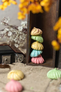 Colourful meringue cookies in a box spring mood