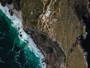 Aerial view of mountain by sea