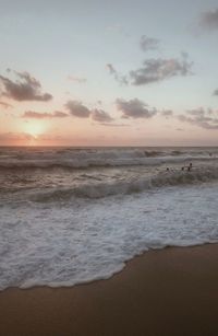 Scenic view of sea against sky during sunset