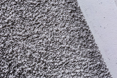 High angle view of snow on rug