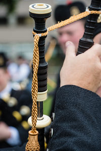 Close-up of man holding rope