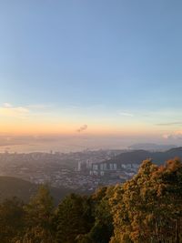 High angle view of cityscape against sky during sunset