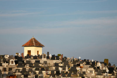 Cemetery with little church in morning light 